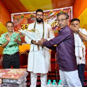 Attended cloth distribution ceremony organized by Baguiati Hawker Union - Photo 1